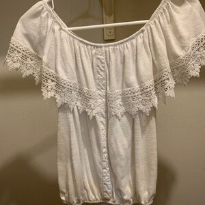 White blouse off the shoulder